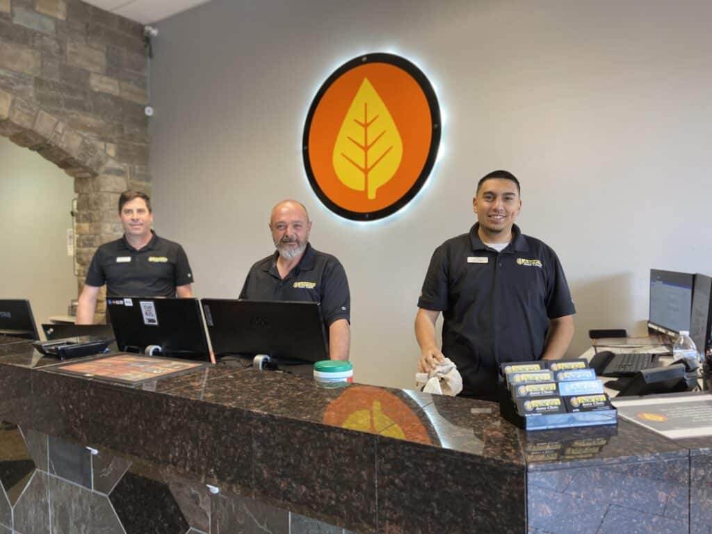 A team standing behind a desk